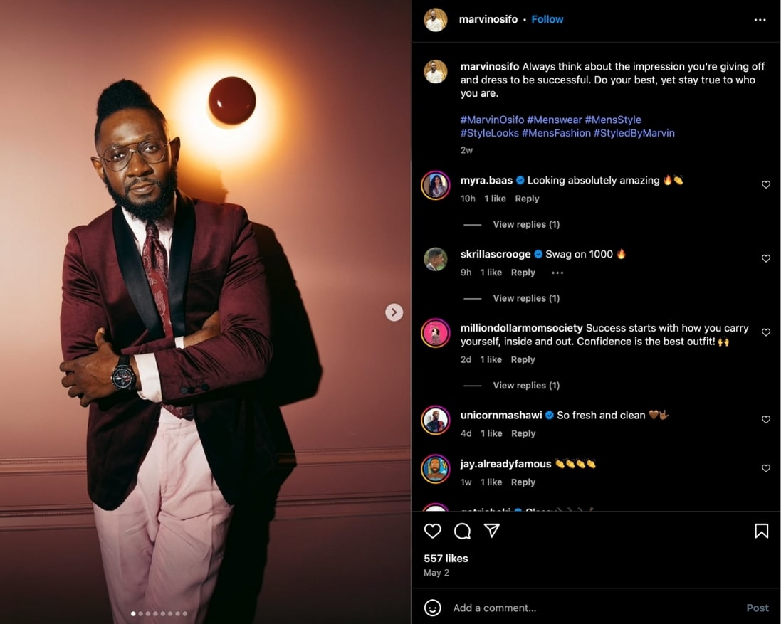 Marvin Osifo shares a carousel of images dressed in a maroon suit jacket and white trousers to Instagram