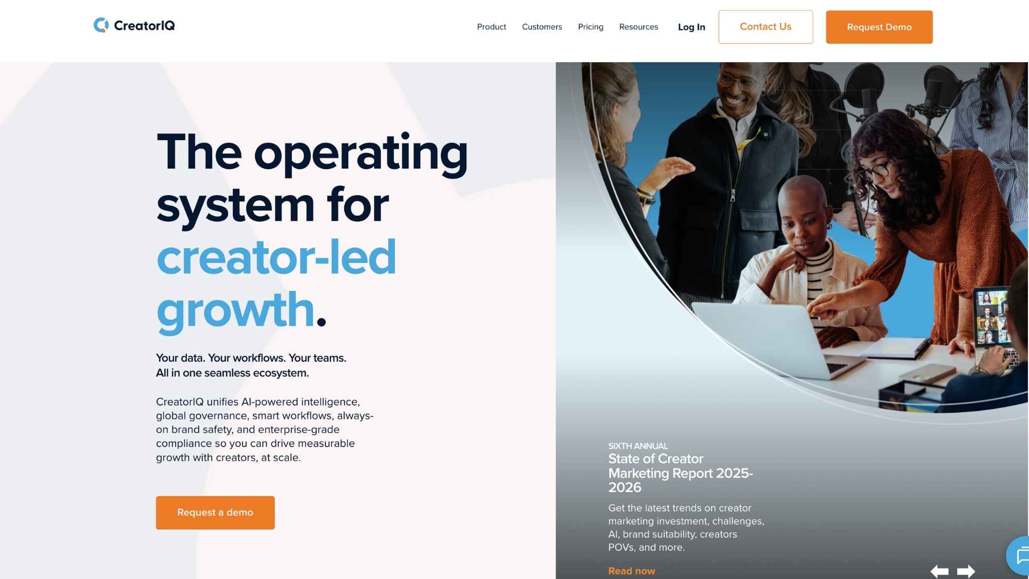 CreatorIQ homepage promoting its creator-led growth platform with a team collaborating over laptops